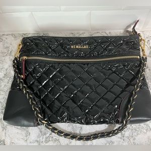 MZ Wallace Crosby black patent crossbody bag, black leather trim, gold accents.